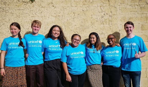 Nele Kalolo, third from left, is one of UNICEF's Aotearoa Young Ambassadors calling for more eligible youth to enrol and vote in this year's NZ general elections.