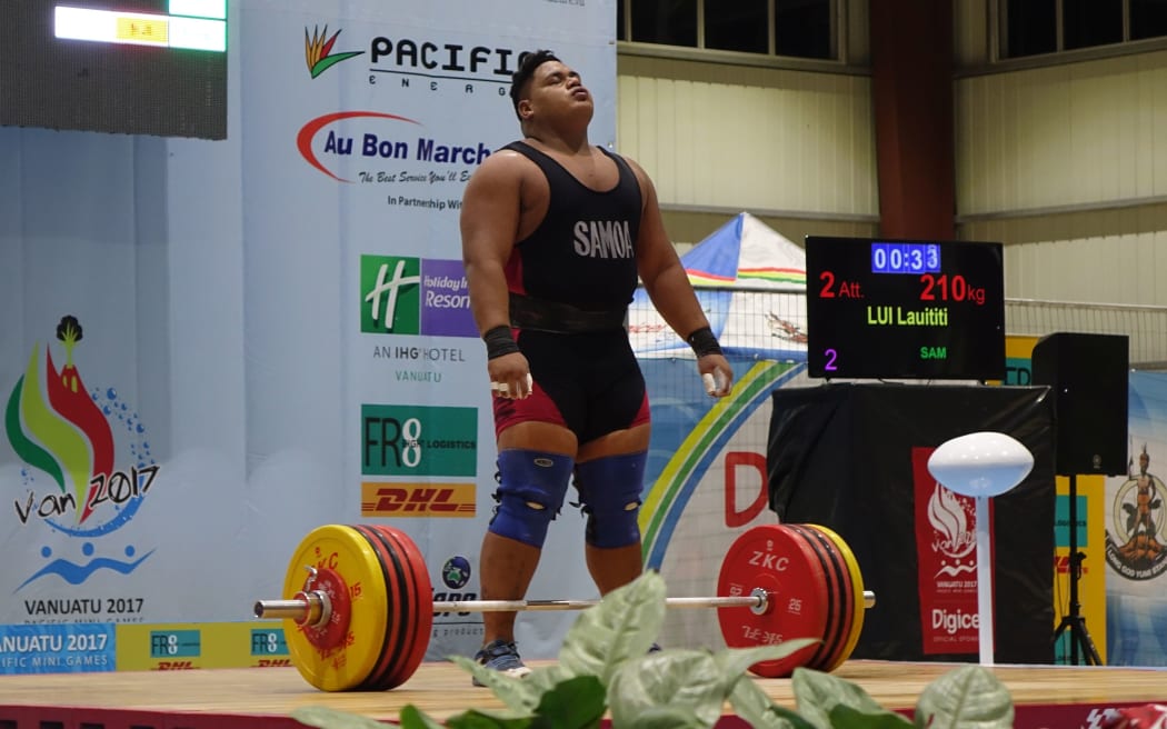 Samoa's Lauititi Lui set new Pacific Games records in the snatch, clean and jerk and total.