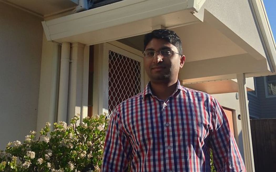 Economist, Shamubeel Eaqub, outside his rented home in Auckland.