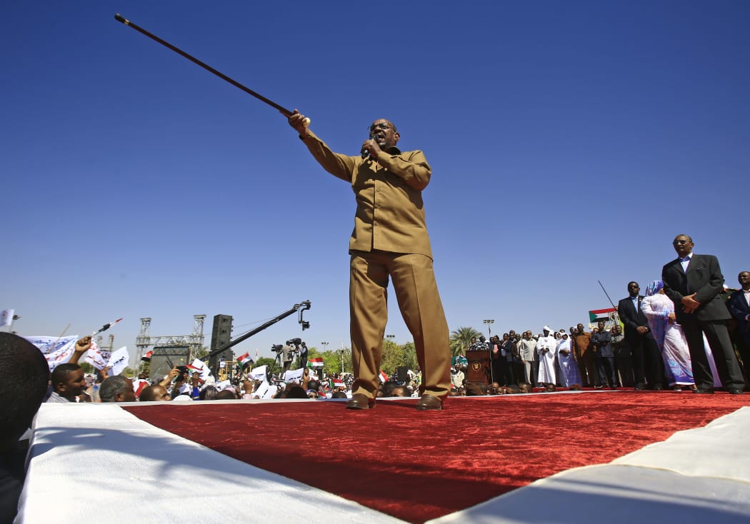 Sudan's President Omar al-Bashir speaks during a rally with his supporters in the Green Square in the capital Khartoum on 9 January, 2019.