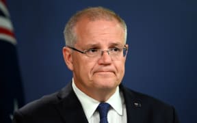 Australia's Prime Minister Scott Morrison briefs media about the flooding situation in Queensland during a press conference in Sydney on February 8, 2019.