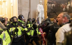 Police intervenes in US President Donald Trump's supporters who breached security and entered the Capitol building in Washington D.C., United States on January 06, 2021.