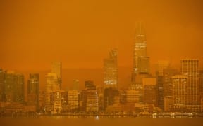 The San Francisco skyline is obscured in orange smoke and haze as their seen from Treasure Island in San Francisco, California on 9 September, 2020.