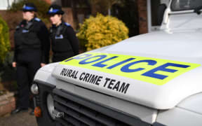 British police say the poisoning of a former Russian spy and his daughter in Salisbury, southern England, is being treated as attempted murder.