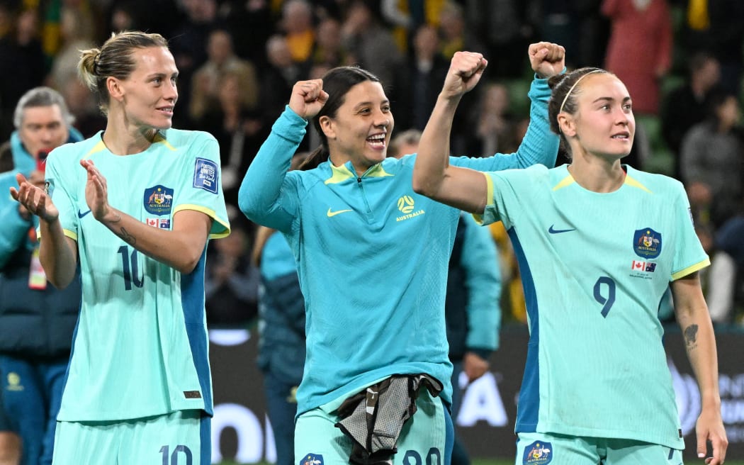 Australia's forward #20 Sam Kerr (C) celebrates with teammates their win at the end of the Australia and New Zealand 2023 Women's World Cup Group B football match between Canada and Australia at Melbourne Rectangular Stadium, also known as AAMI Park, in Melbourne on July 31, 2023.