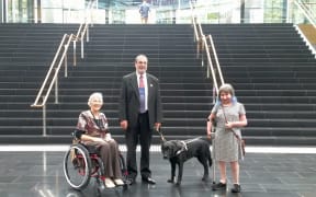 (From left) Vivian Naylor of CCS Disability Action, Chris Orr of the Blind Foundation and Esther Woodbury of Disabled Persons Assembly NZ, inside the Spark Building on Victoria Street West in central Auckland.