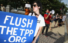 Demonstrators protest against the Trans Pacific Partnership trade agreement outside the Senate office buildings on Capitol Hill June 23, 2015 in Washington, DC. Chip Somodevilla/Getty Images/AFP
