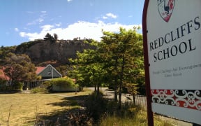 Education Minister Hekia Parata says the unstable cliff behind the Redcliffs School makes the site unsuitable for a school.