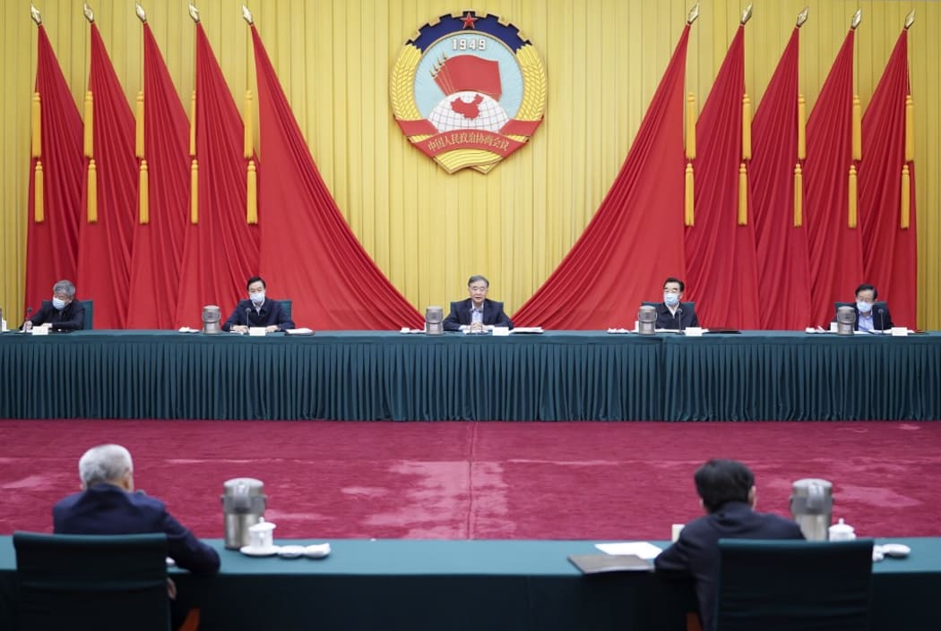 Wang Yang presides over a meeting held by the Chairperson's Council of the CPPCC National Committee in Beijing.