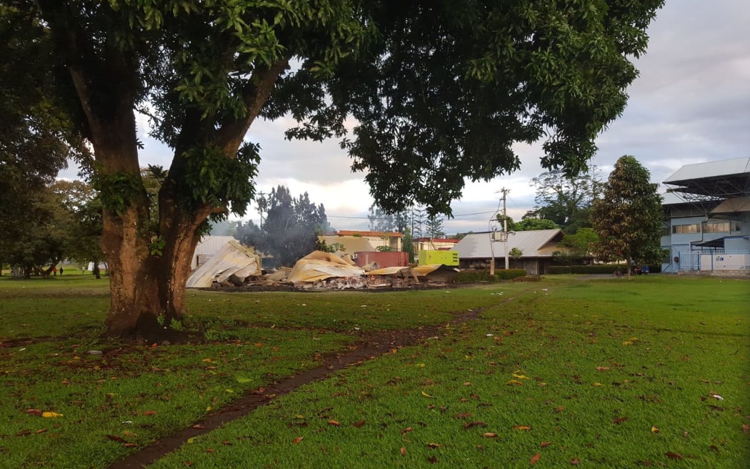 The remains of a building at the University of Technology in Lae, PNG, after it was burned to the ground in violent clashes.