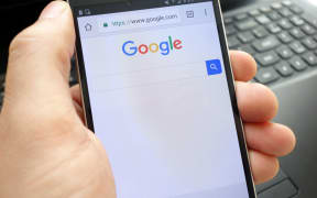 Smartphone with Google search browser.