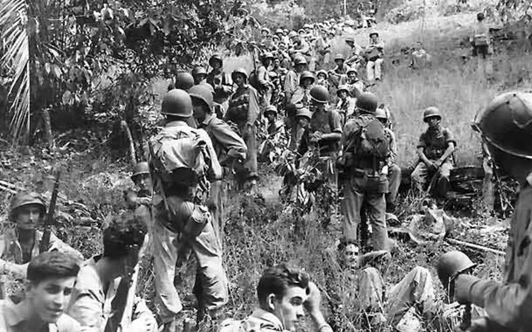 Marines rest in the field on Guadalcanal.