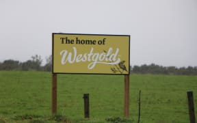 A sign promoting Westgold Butter made by Westland Milk Products.
