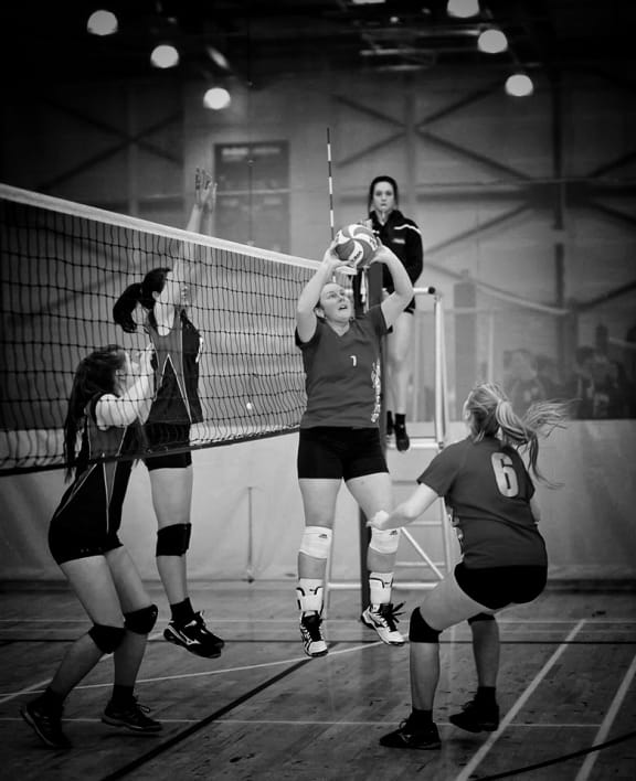 NZ volleyballer Lauren Fleury setting the ball.