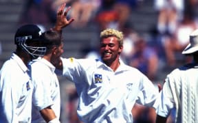 Heath Davis celebrates taking a wicket in a test against England in 1997.