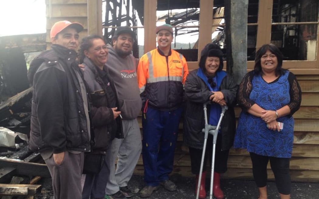 The Tautoko FM crew following the fire.