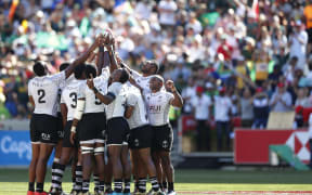 Fiji huddle before their semi final against South Africa.