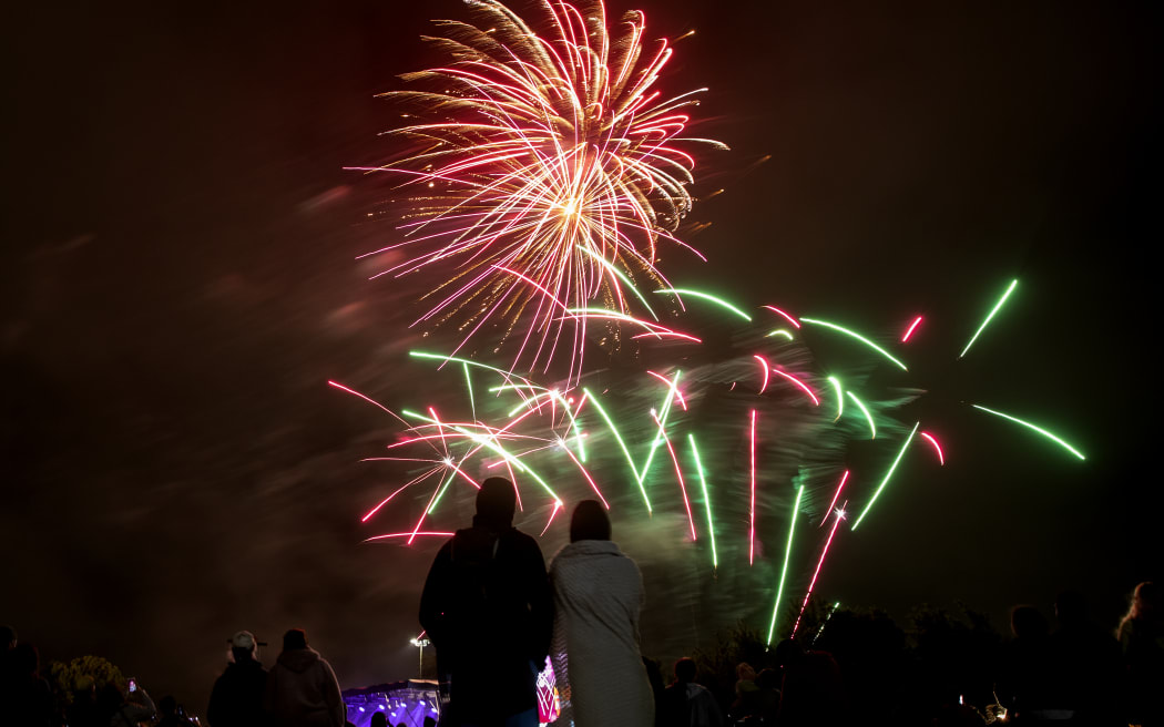 People watch fireworks during New Year's Eve celebrations in Christchurch on 1January 2021.