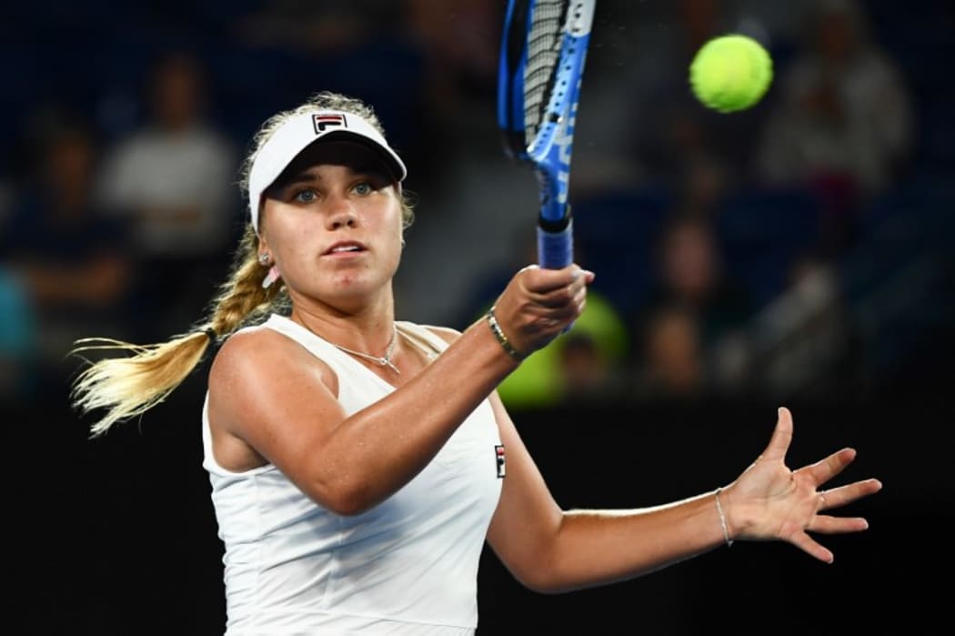 Sofia Kenin of the US hits a return against Romania's Simona Halep at the Australian Open tennis tournament in Melbourne on January 17, 2019.