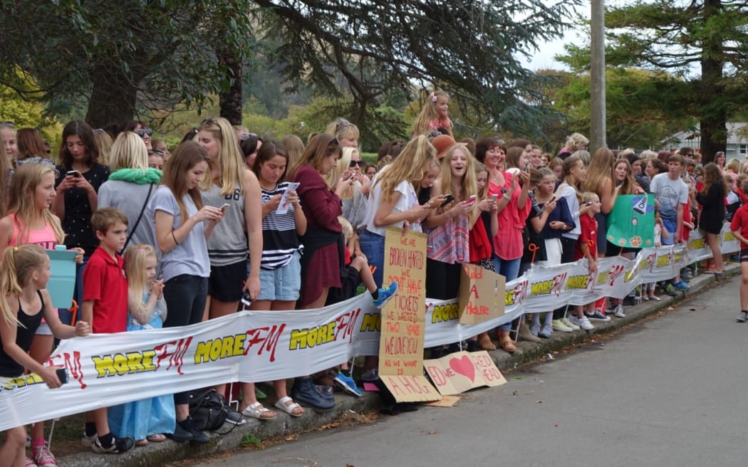 Fans wait for Ed Sheeran outside Redcliffs Primary School.