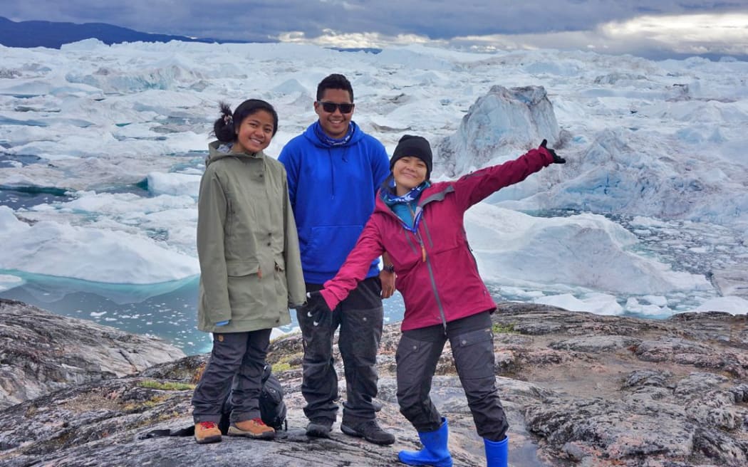 Micronesia area students standing near the Ilulissat Fjord, Greenland. From left: Karen Ehmes of Pohnpei, Dylan Tellei of Palau and Chloe Arnold of Chuuk. Photo: Danko Taborosi.