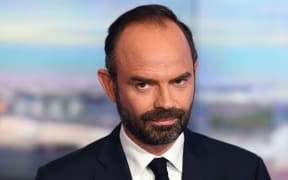 France's newly appointed Prime Minister Edouard Philippe poses prior to taking part in the evening news broadcast of French TV channel TF1.
