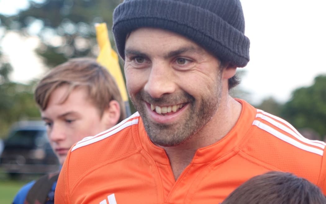 Hurricanes skipper Conrad Smith mingled with fans after training at his old school Francis Douglas Memorial College in New Plymouth yesterday.