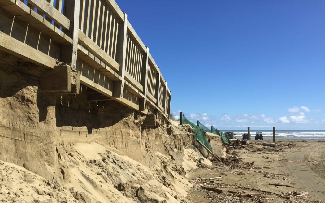 Cyclone Gabrielle damage to Baylys Beach's new boardwalk where pedestrians accessing
Ripiro Beach can for the first time be separated from a constant stream of vehicles also using the coastal area.