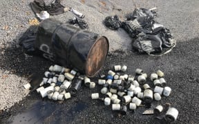 Auckland council is cracking down on illegal rubbish dumping, like these oil drums found on Ardmore Road.