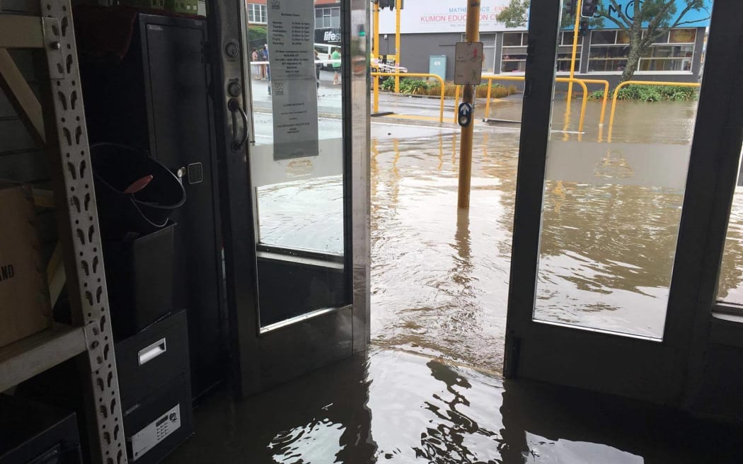Flooding in the New Lynn locksmiths store on March 12.