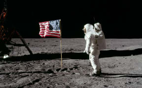 Buzz Aldin salutes the US flag on the moon