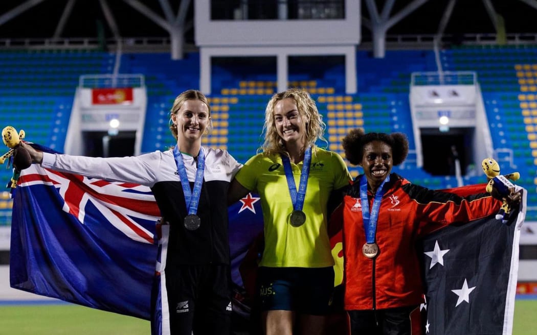 Camryn Smart on podium with Australian Ellie Beer (middle) and Papua New Guinea Leonie Beu (right) at Pacific Games, 2023.