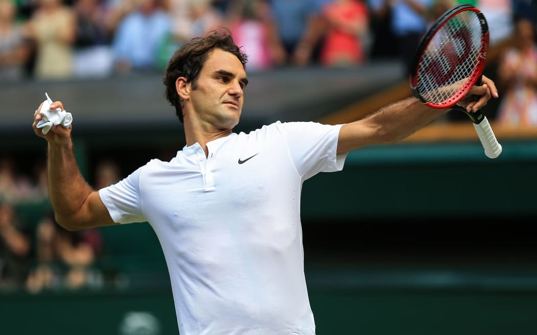 Roger Federer celebrates his 2nd round victory, Wimbledon, 2015.