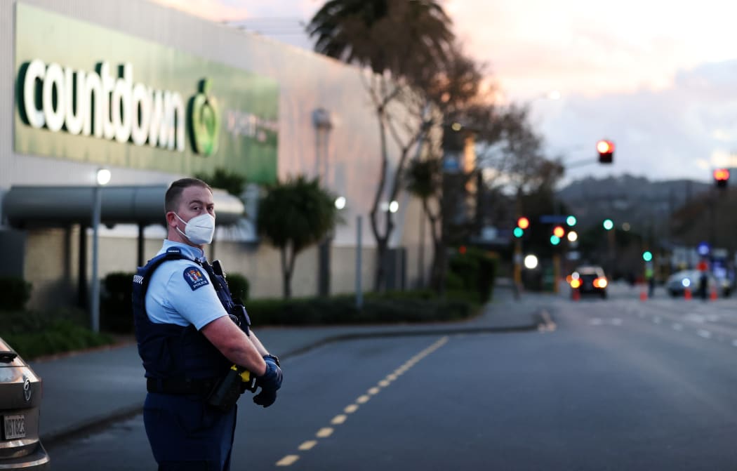 AUCKLAND, NEW ZEALAND - SEPTEMBER 03: Police guard the area around Countdown LynnMall after a violent extremist took out a terrorist attack stabbing six people before being shot by police on September 03, 2021 in Auckland,