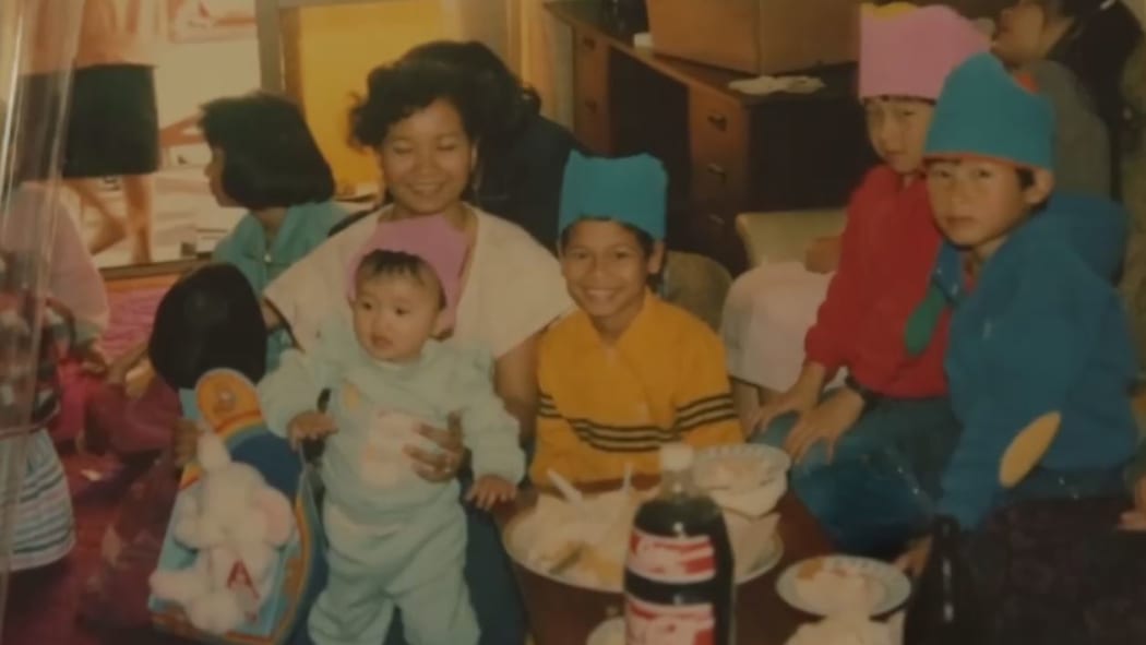 Lucy Zee (in the pink hat) with her family