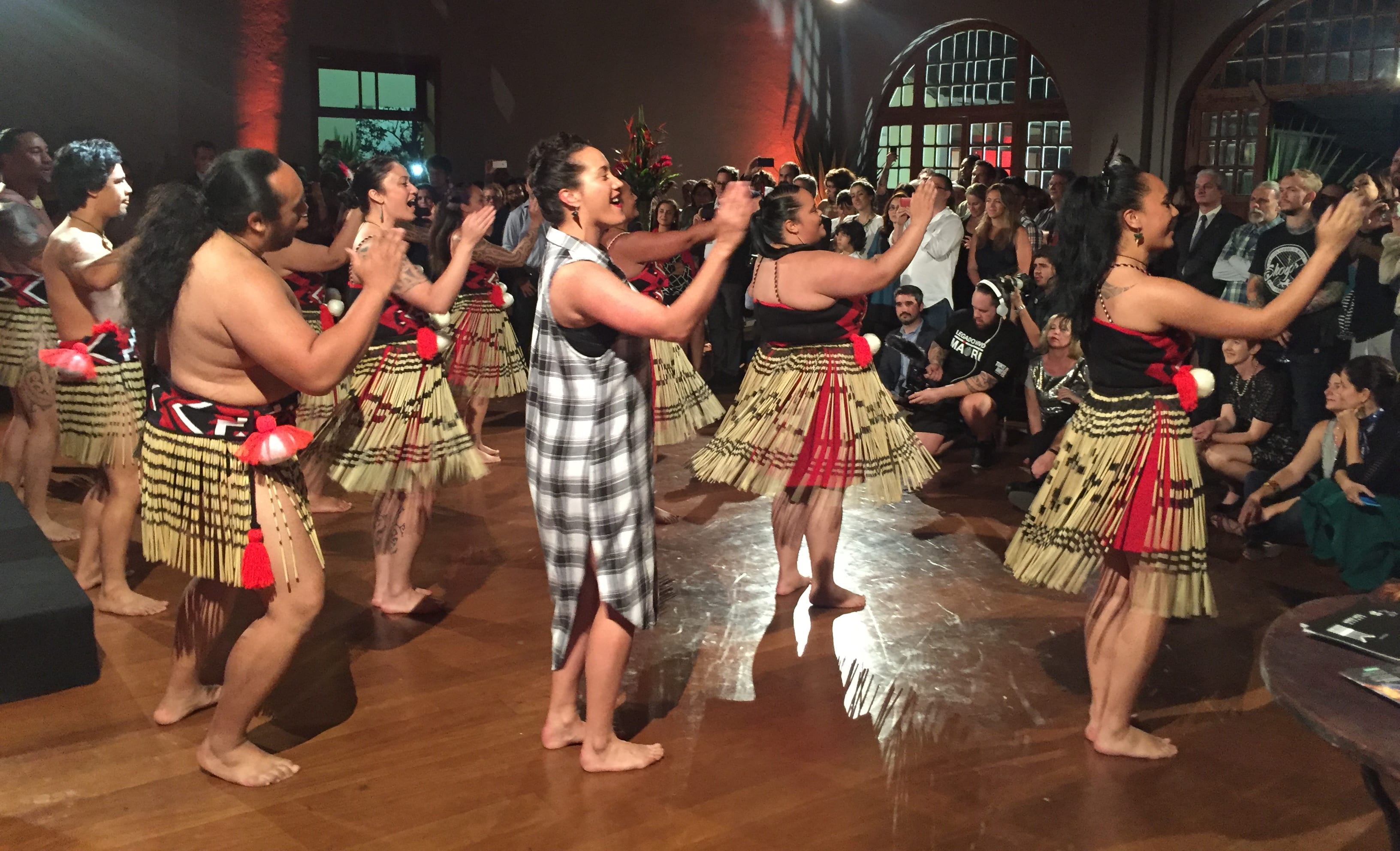 New Zealand songstress Ria Hall (in black and white dress) joins the New Zealand Maori Arts and Crafts Institute | Nga Kete Tuku Iho Kapa Haka group at the official opening of the Tuku Iho Exhibition in Rio de Janeiro
