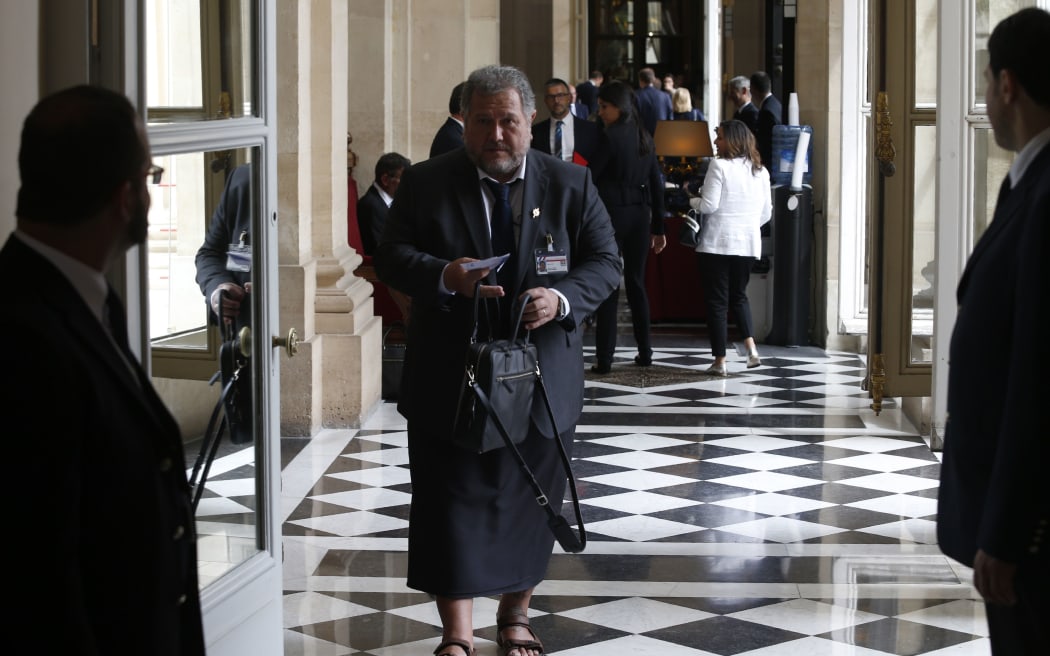 Polynesian member of the parliament Moetai Brotherson leaves the French National assembly after France's new parliament sat for the first time, on June 27, 2017 in Paris.