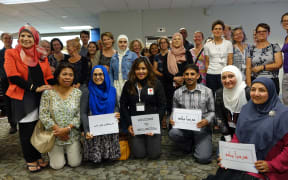 Members of New Zealand's Syrian community gather to welcome new refugee arrivals to Wellington on 26 February 2016.