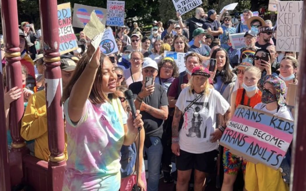 Green Party co-leader Marama Davidson speaking at today's counter-protest against anti-transgender activist Posie Parker at Albert Park in Auckland.