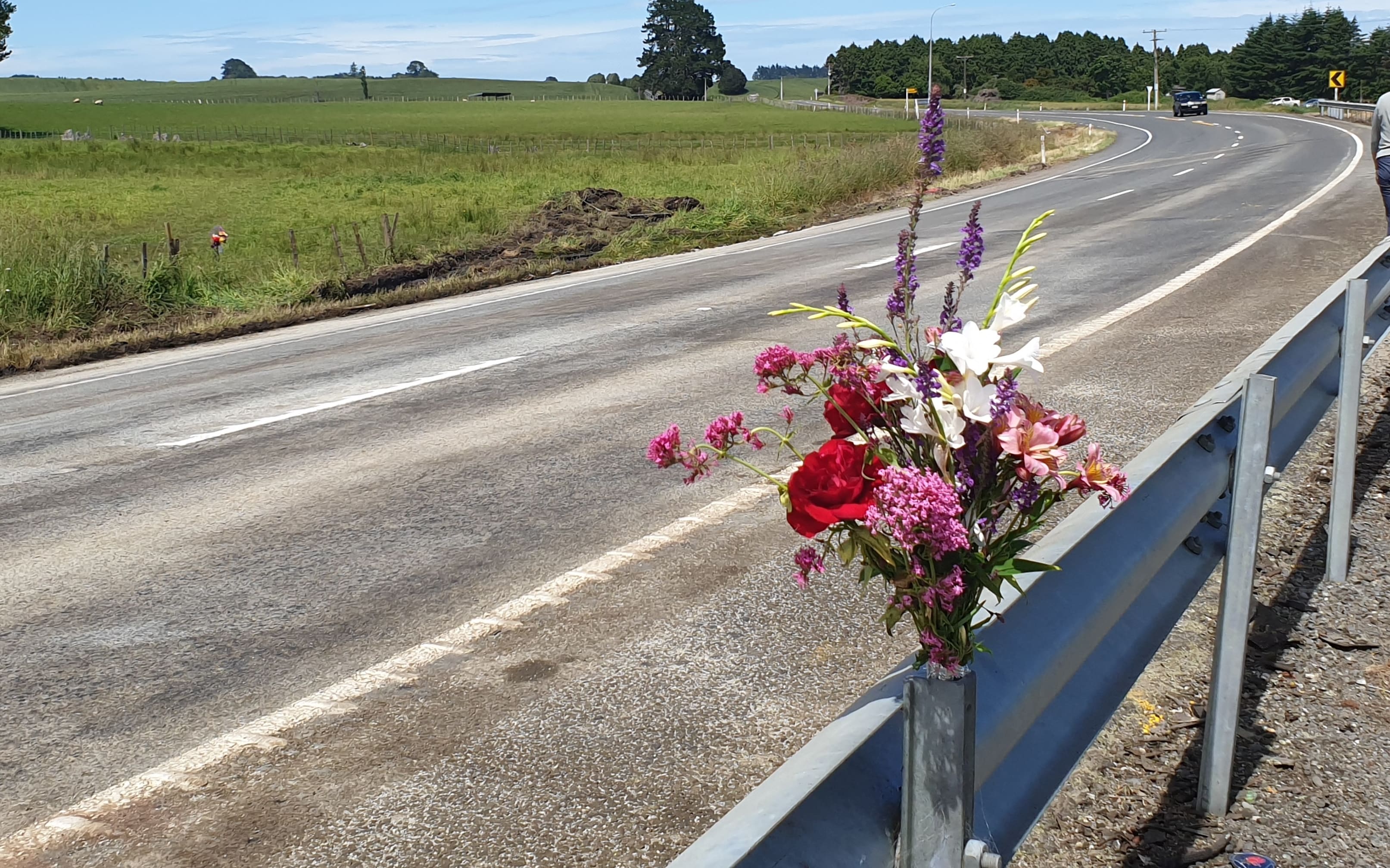 Flowers have been put near where three people died on 1 December, 2020, in a crash on State Highway 2, near Takapau, Hawke's Bay.