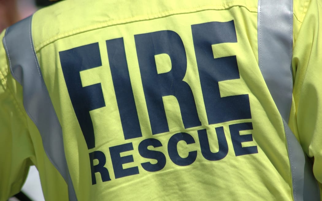 14915103 - fireman wearing a fire rescue jacket