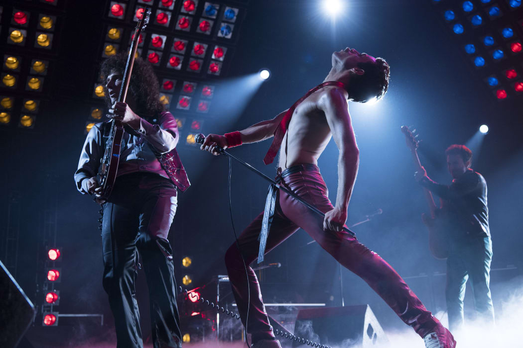 This image released by Twentieth Century Fox shows Gwilym Lee, from left, Rami Malek and Joe Mazzello in a scene from "Bohemian Rhapsody."