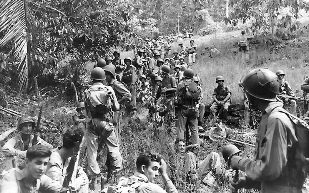 US Marines rest in the field on Guadalcanal