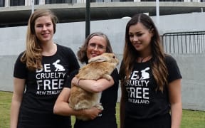 From left, owner of Crumpet the Rabbit Greta-Mae McDowell, Green Party MP Mojo Mathers and #BeCrueltyFree campaigner Tara Jackson.