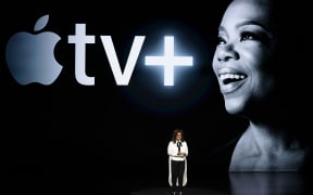 Oprah Winfrey speaks at the Steve Jobs Theatre during the announcement of Apple's new streaming service.