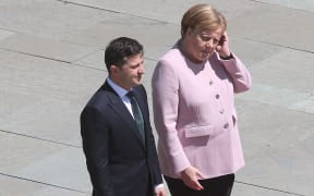 President of Ukraine Volodymyr Selensky with Chancellor Angela Merkel during his inaugural visit to Germany.