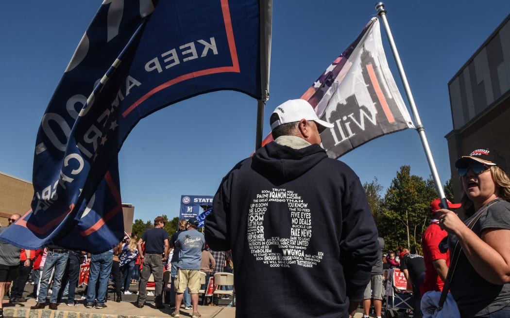 A person wears a QAnon sweatshirt during a pro-Trump rally on October 3, 2020 in the borough of Staten Island in New York City.