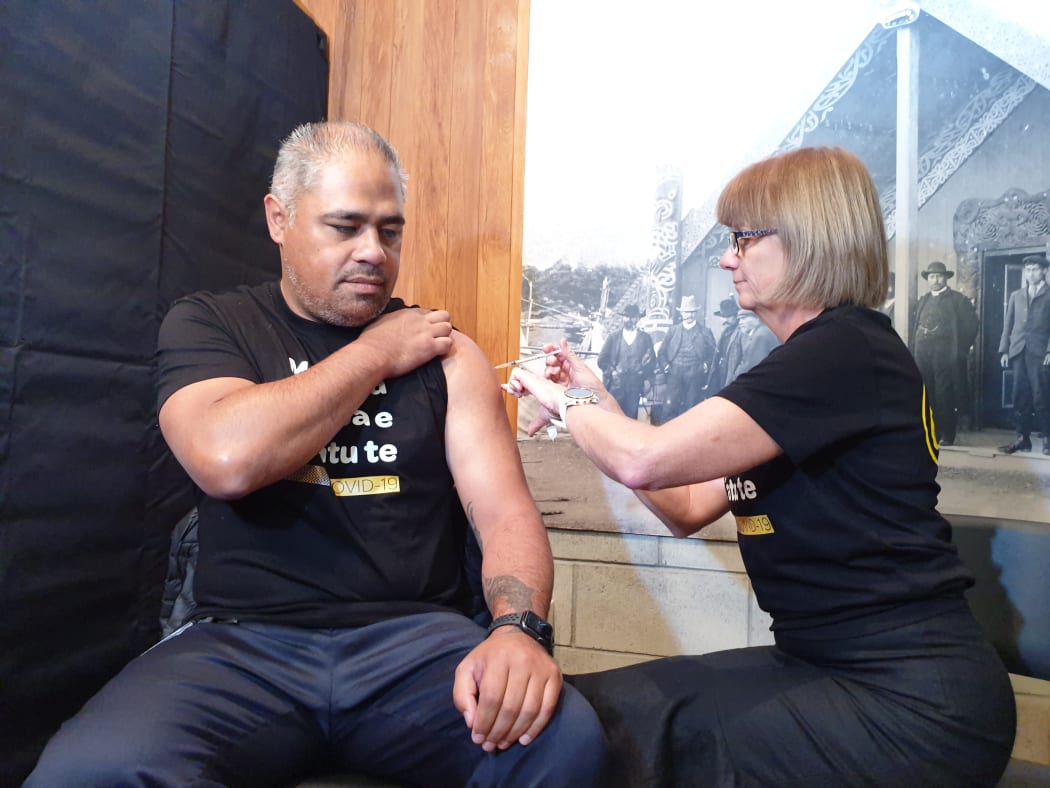 Associate Health Minister Peeni Henare receives a Covid-19 vaccine, Porirua, 7 April 2021.