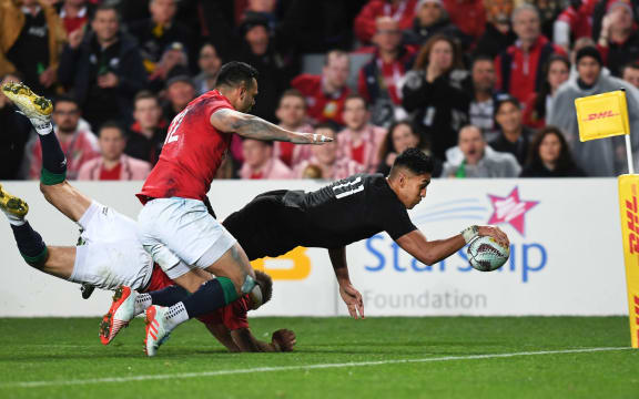 Rieko Ioane goes in for his try.