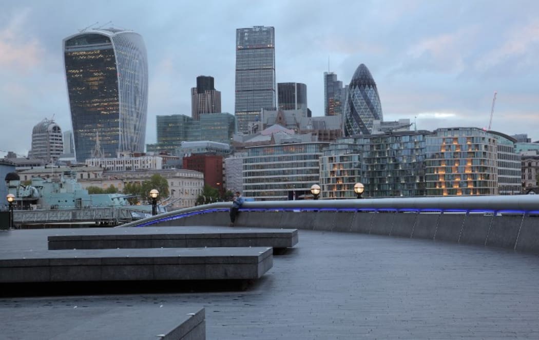 Part of the More London Thames riverside development on the South bank of the river Thames, London, England, with HMS Belfast on the left, and (left-right) the Walkie Talkie building  the NatWest Tower, the Cheesegrater or Leadenhall Building and the Gherkin. Picture by Manuel Cohen